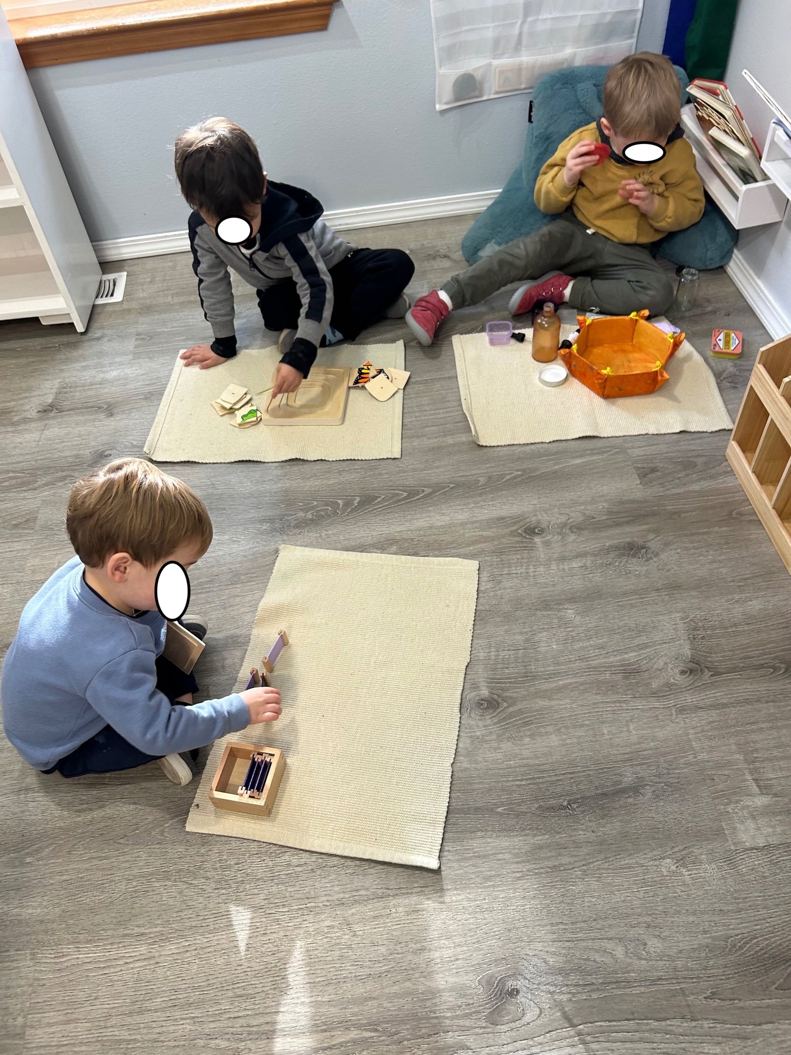Children working together in a Montessori classroom