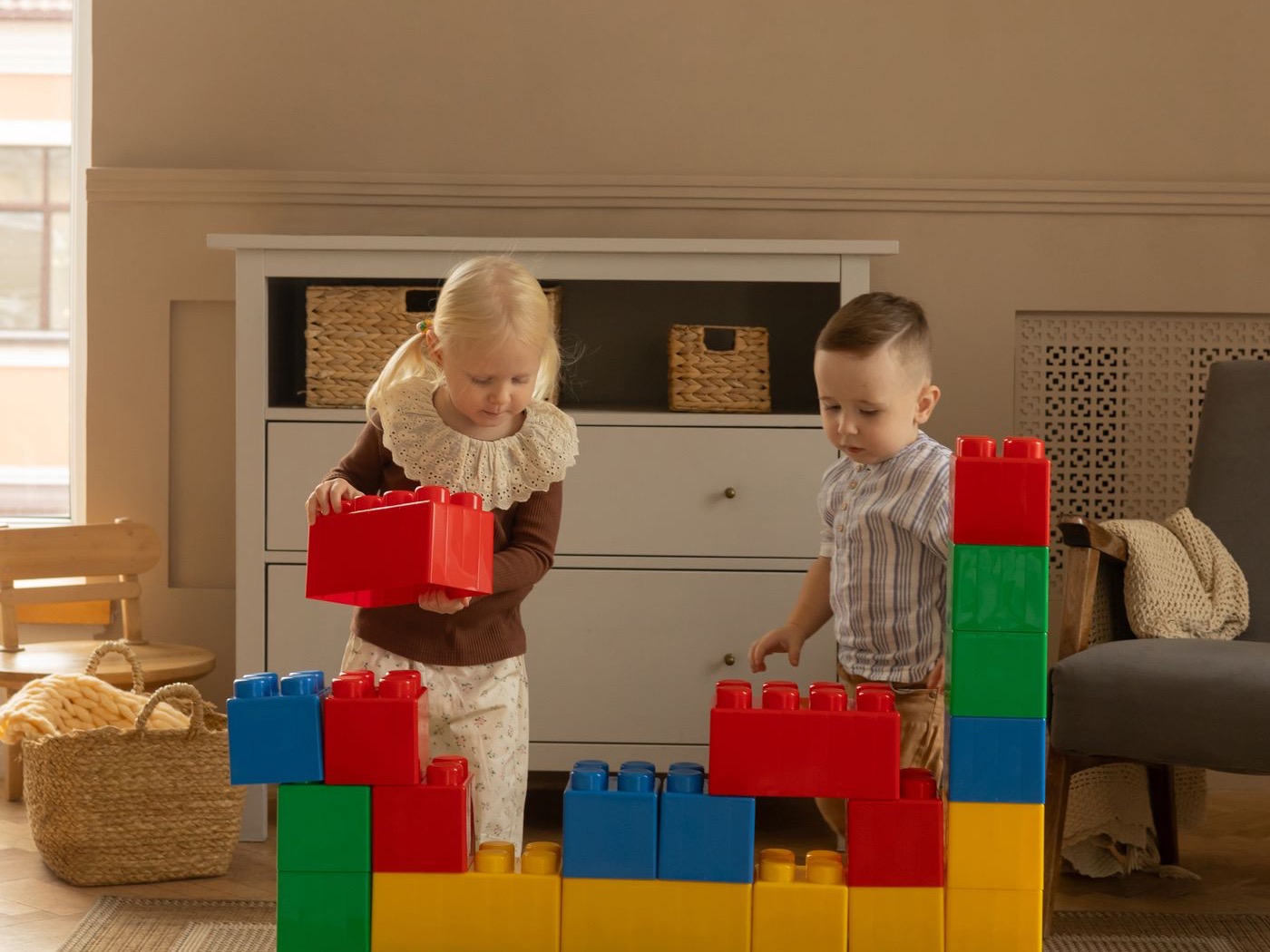Children building with colorful blocks